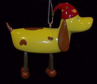 Kerst hond - geel met rode muts